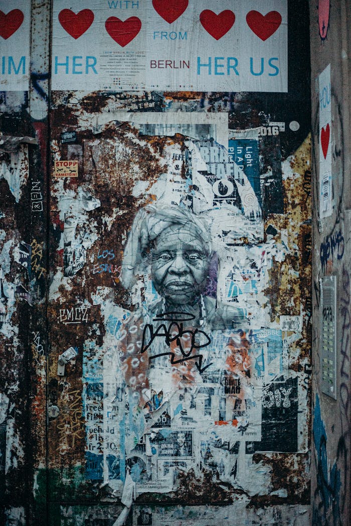 Detailed portrait of a woman in Berlin's urban graffiti scene, showcasing vibrant street art.